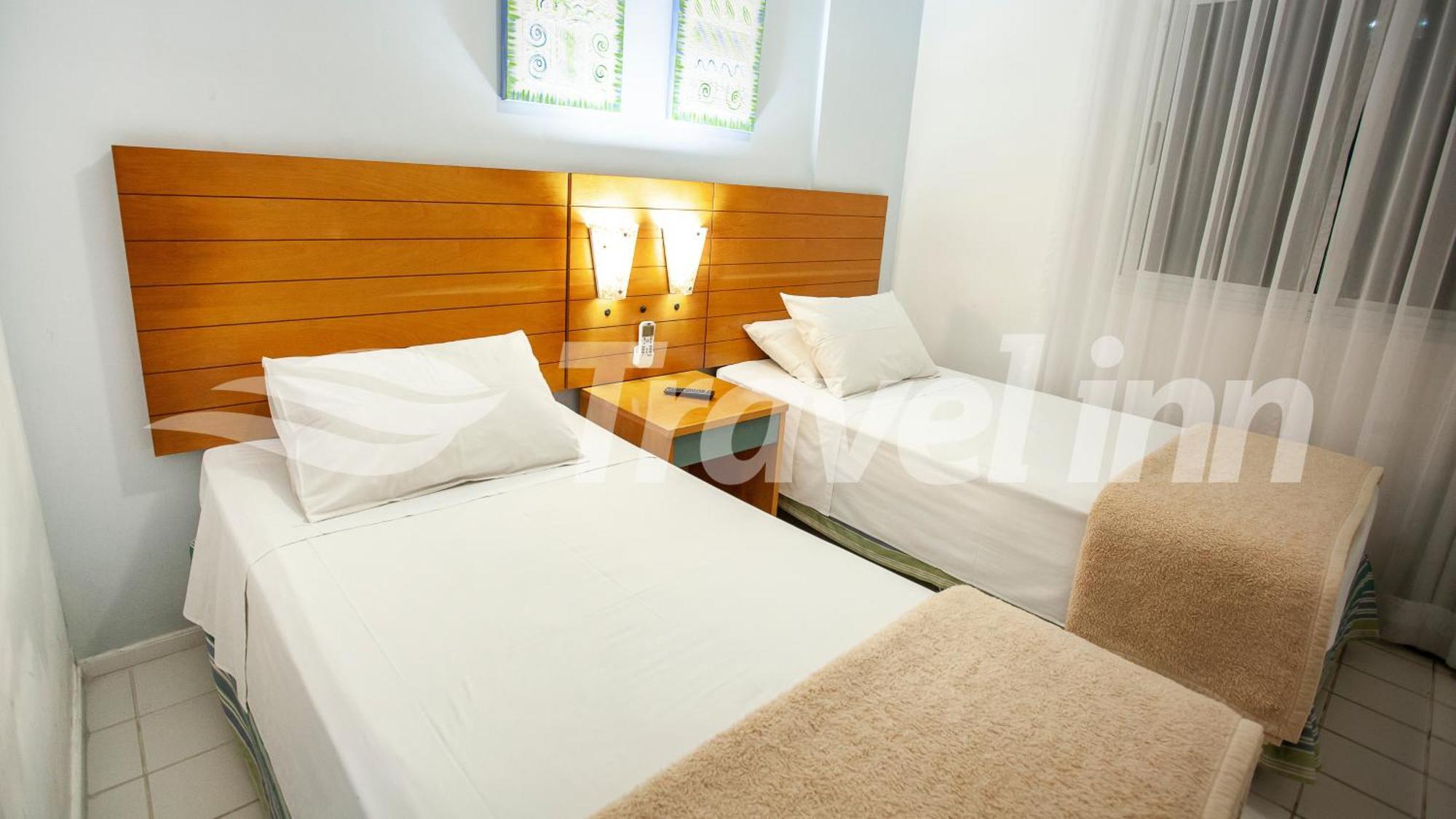 Travel Inn Flats Riviera Bertioga Bagian luar foto
