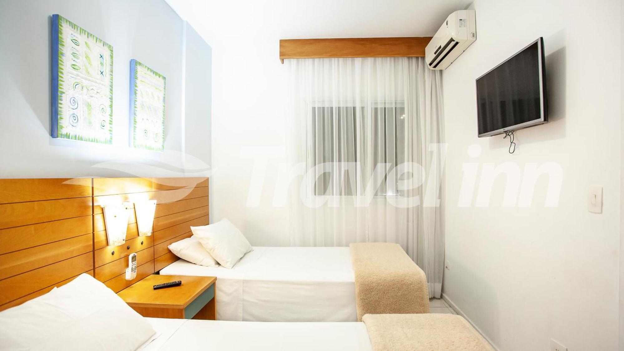 Travel Inn Flats Riviera Bertioga Bagian luar foto